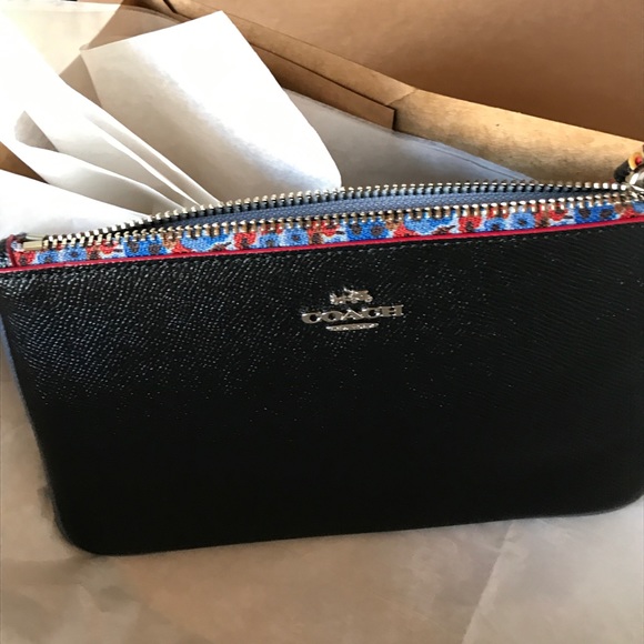 Coach Handbags - Authentic COACH leather zip wristlet /Flowers trim
